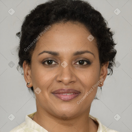 Joyful latino adult female with short  brown hair and brown eyes