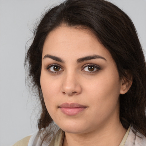 Neutral white young-adult female with medium  brown hair and brown eyes