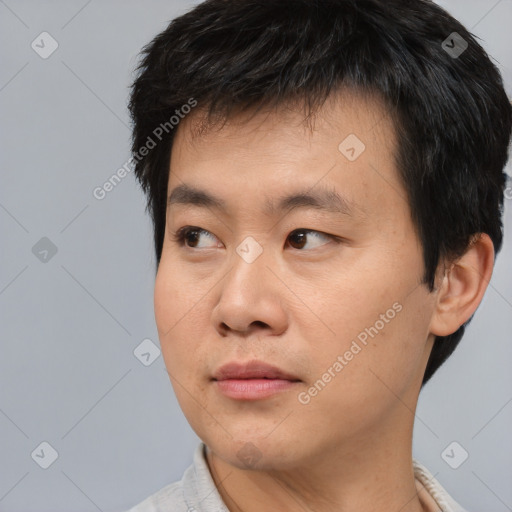 Neutral asian young-adult male with short  black hair and brown eyes