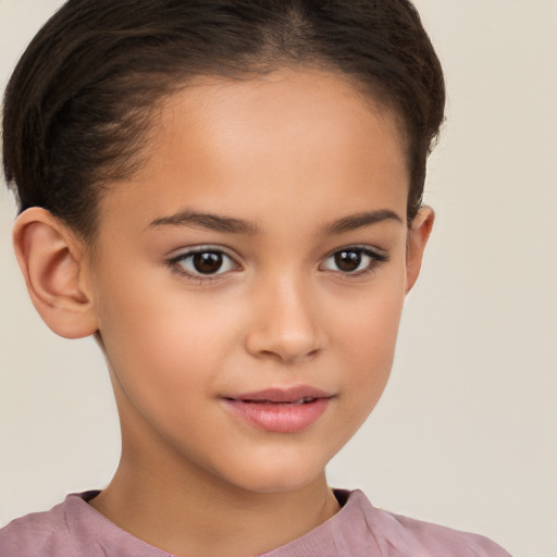 Joyful white child female with short  brown hair and brown eyes