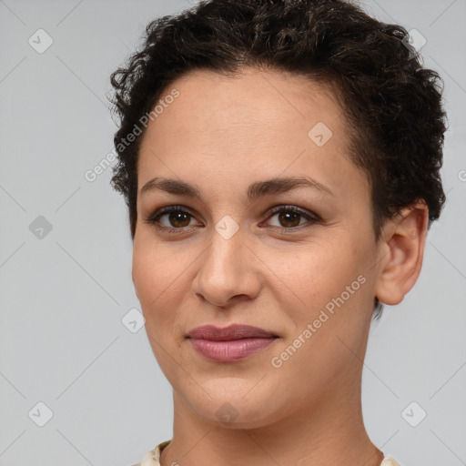 Joyful white young-adult female with short  brown hair and brown eyes