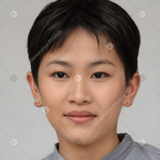 Joyful asian young-adult female with short  brown hair and brown eyes