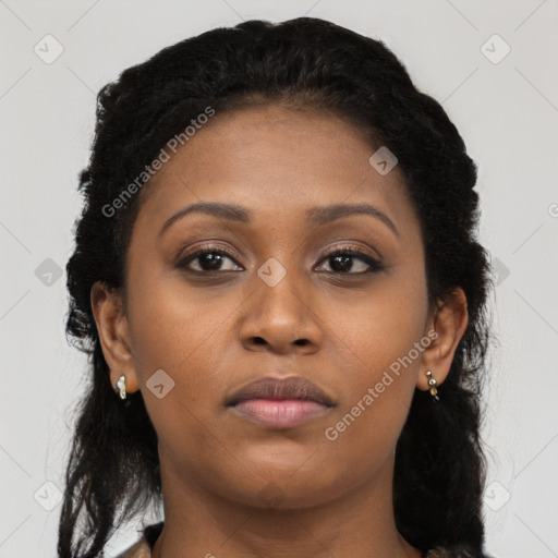 Neutral black young-adult female with long  brown hair and brown eyes