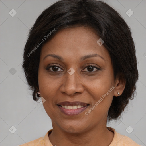 Joyful latino adult female with medium  brown hair and brown eyes