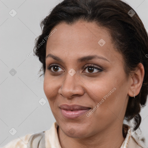 Joyful white adult female with medium  brown hair and brown eyes