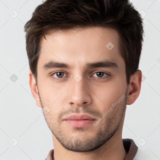 Neutral white young-adult male with short  brown hair and brown eyes