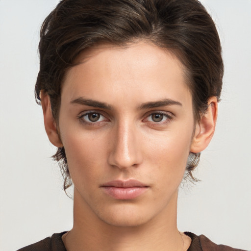 Neutral white young-adult female with short  brown hair and brown eyes