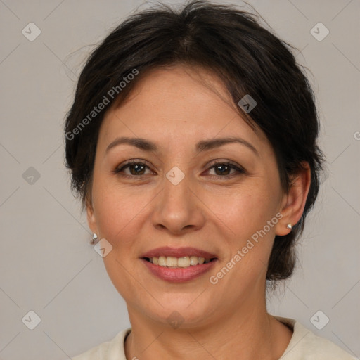 Joyful white adult female with medium  brown hair and brown eyes