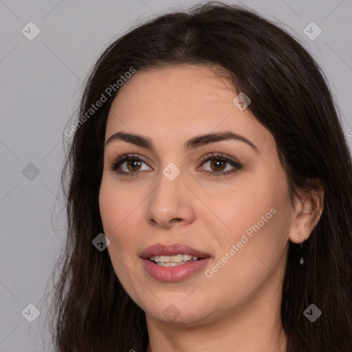 Joyful white young-adult female with long  brown hair and brown eyes