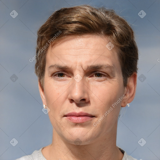 Joyful white adult male with short  brown hair and grey eyes