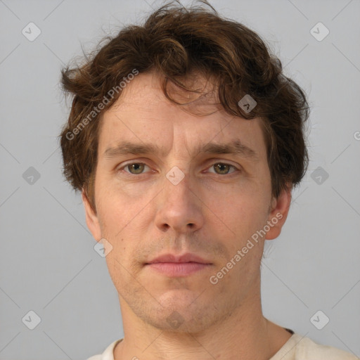 Neutral white adult male with short  brown hair and brown eyes