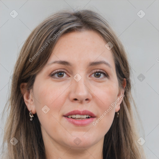 Joyful white adult female with long  brown hair and grey eyes