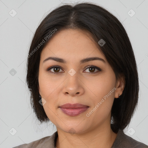 Joyful latino young-adult female with medium  brown hair and brown eyes