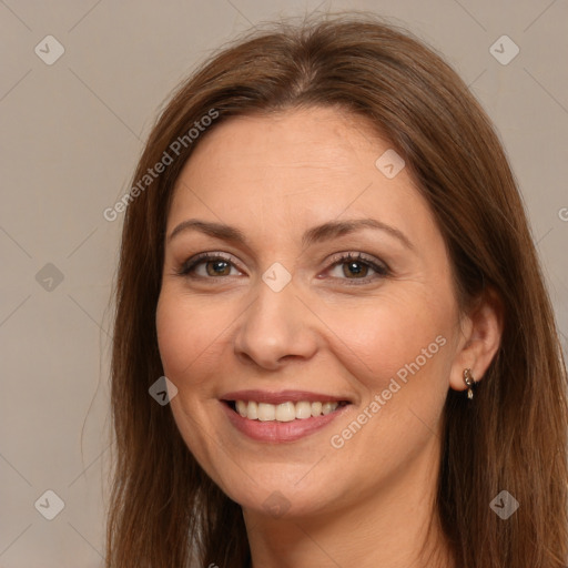 Joyful white adult female with long  brown hair and brown eyes