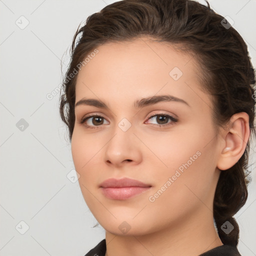 Neutral white young-adult female with medium  brown hair and brown eyes