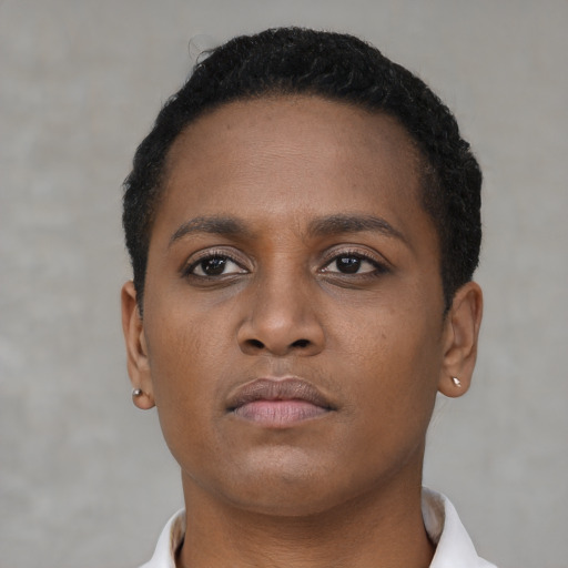 Neutral black young-adult female with short  brown hair and brown eyes