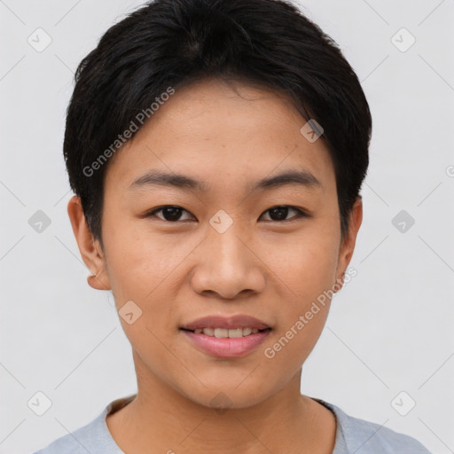 Joyful asian young-adult female with short  black hair and brown eyes