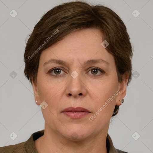 Joyful white adult female with short  brown hair and grey eyes