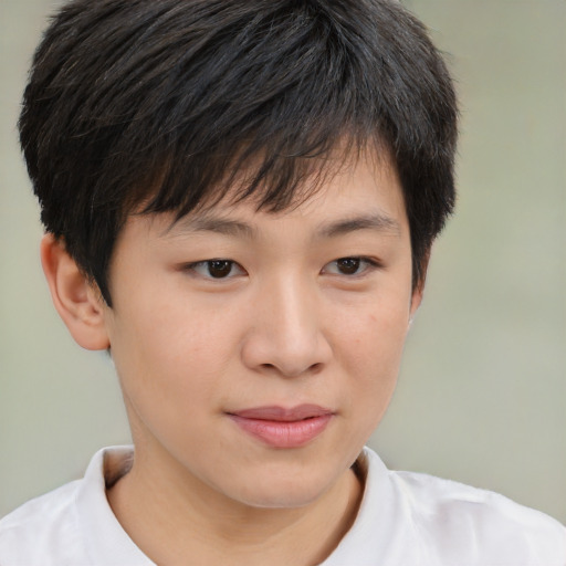 Joyful white child female with short  brown hair and brown eyes