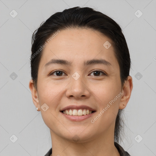 Joyful white young-adult female with short  brown hair and brown eyes