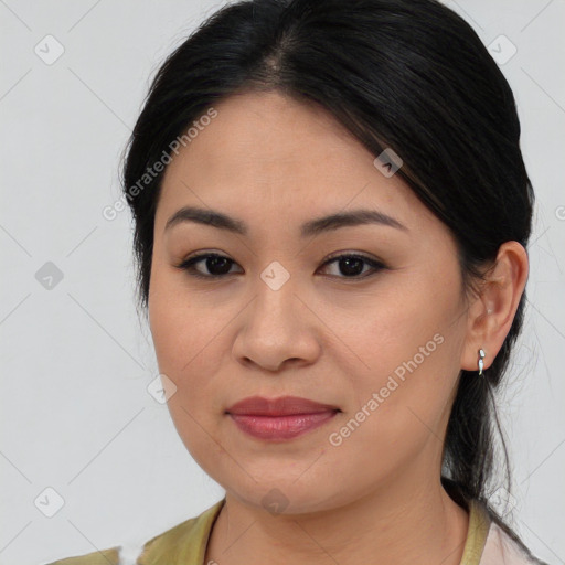 Joyful asian young-adult female with medium  brown hair and brown eyes