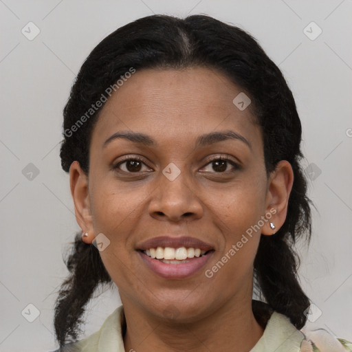 Joyful black young-adult female with medium  brown hair and brown eyes