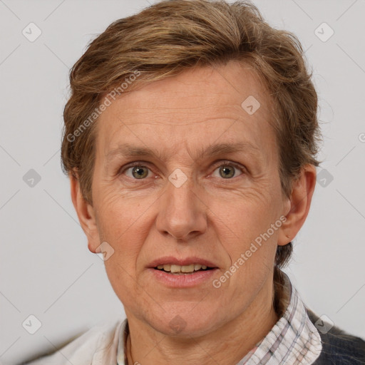 Joyful white middle-aged female with short  brown hair and brown eyes