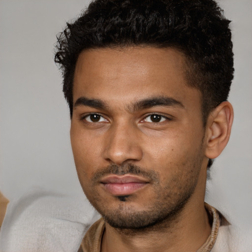 Neutral black young-adult male with short  brown hair and brown eyes