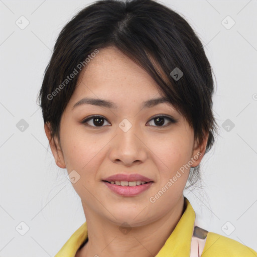 Joyful asian young-adult female with short  brown hair and brown eyes