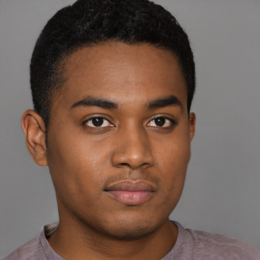 Neutral black young-adult male with short  brown hair and brown eyes