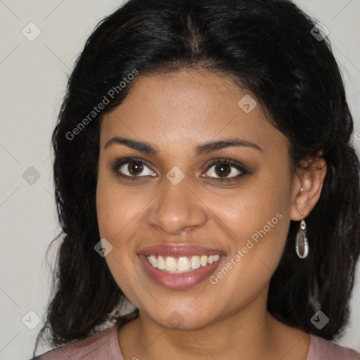 Joyful black young-adult female with medium  brown hair and brown eyes