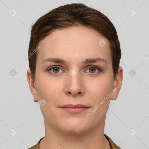 Joyful white young-adult female with short  brown hair and grey eyes