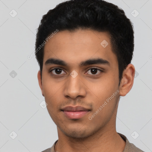 Neutral latino young-adult male with short  black hair and brown eyes