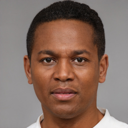 Neutral black young-adult male with short  brown hair and brown eyes