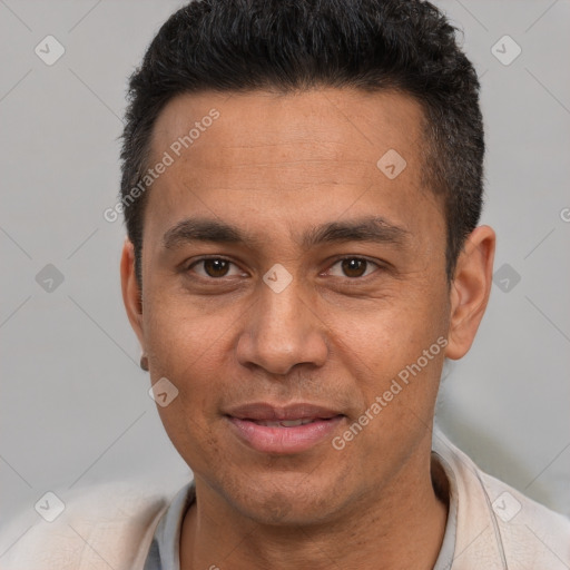 Joyful white adult male with short  brown hair and brown eyes