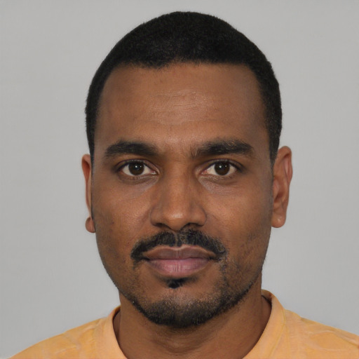 Neutral black young-adult male with short  black hair and brown eyes