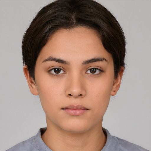 Neutral white young-adult female with short  brown hair and brown eyes