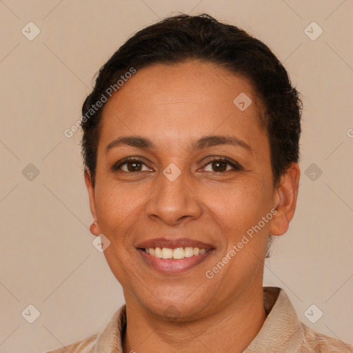 Joyful latino young-adult female with short  brown hair and brown eyes