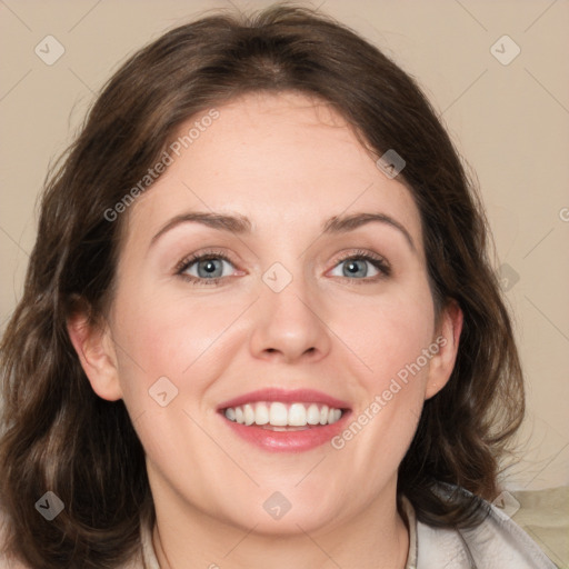 Joyful white young-adult female with medium  brown hair and blue eyes