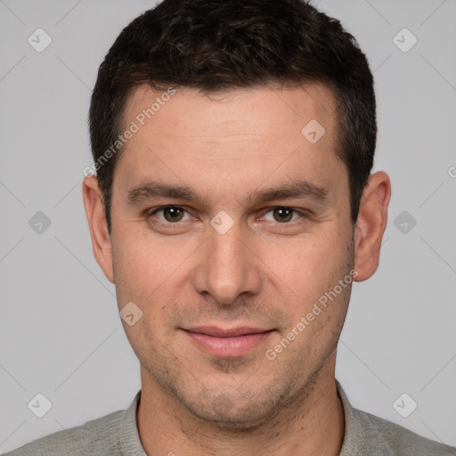 Joyful white young-adult male with short  brown hair and brown eyes