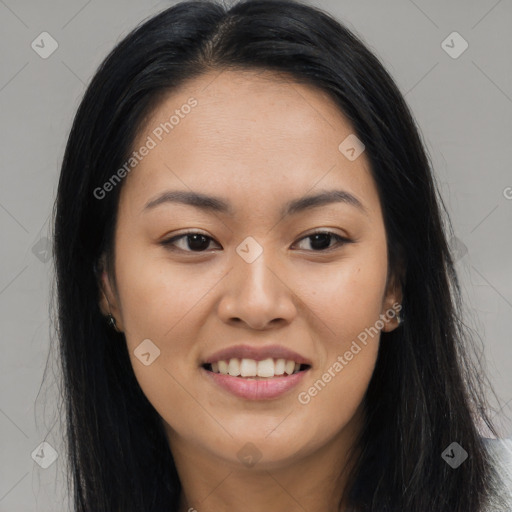 Joyful asian young-adult female with long  brown hair and brown eyes