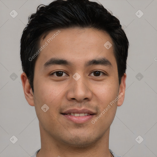 Joyful latino young-adult male with short  brown hair and brown eyes