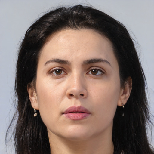 Neutral asian young-adult female with long  brown hair and brown eyes