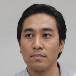 Neutral asian adult male with short  black hair and brown eyes