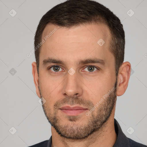 Neutral white adult male with short  brown hair and brown eyes