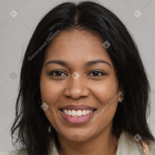 Joyful black young-adult female with long  brown hair and brown eyes