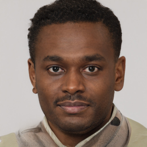 Neutral black young-adult male with short  brown hair and brown eyes