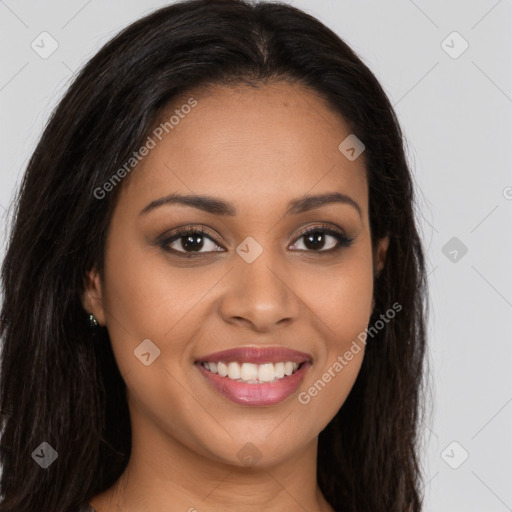 Joyful latino young-adult female with long  brown hair and brown eyes