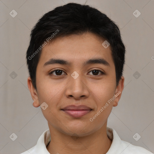 Joyful latino young-adult male with short  black hair and brown eyes