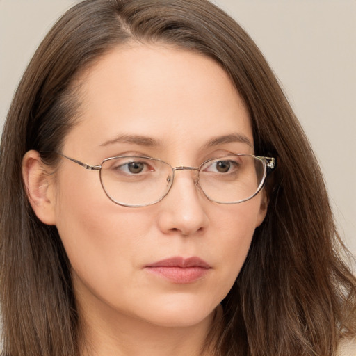 Neutral white young-adult female with long  brown hair and grey eyes